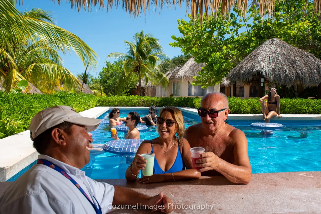 couple enjoying the all inclusive pool bar